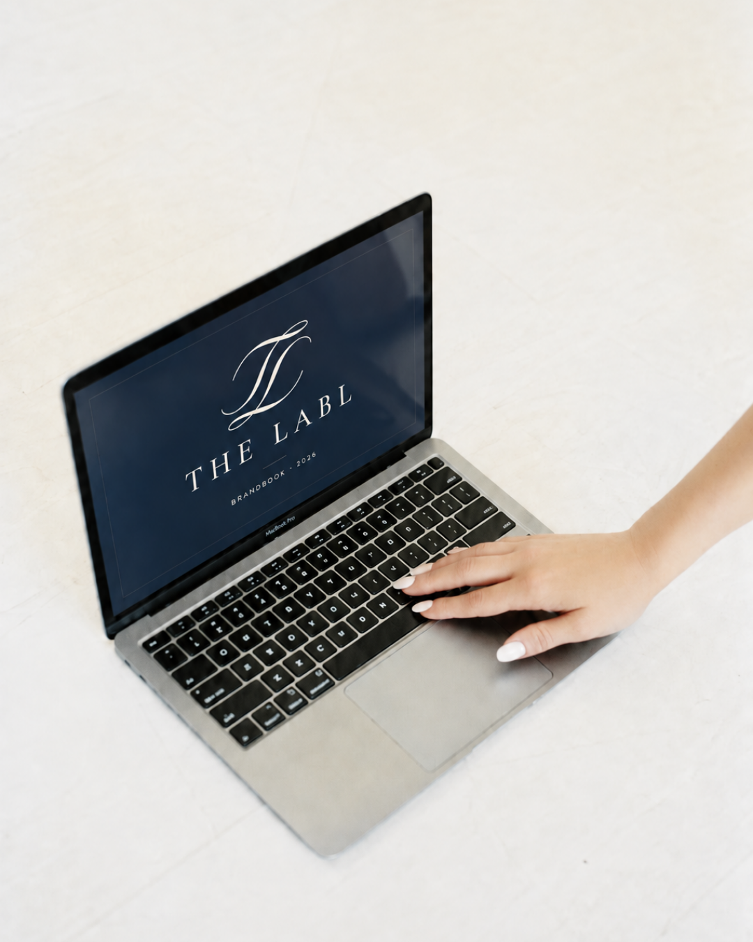 The Labl brand book on a laptop